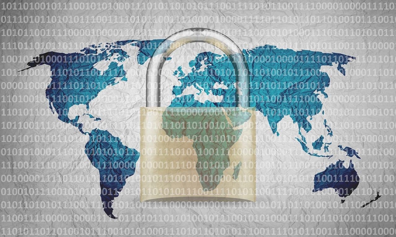 A padlock over a world map rendered in binary code