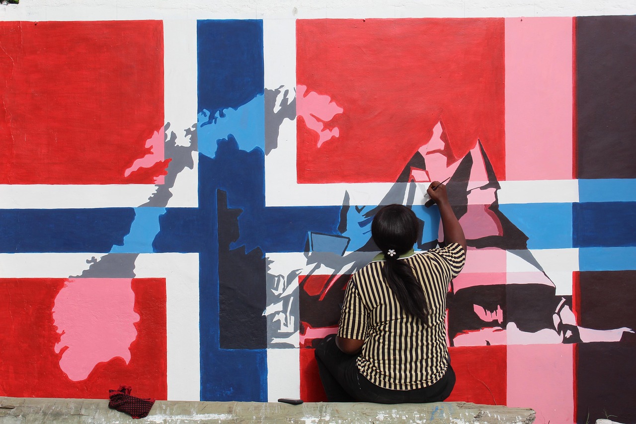 A world map with a country flag painted on it